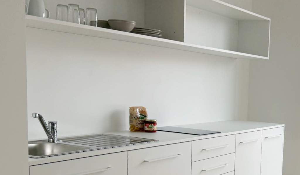 Fully equipped kitchenette in an RW63 apartment